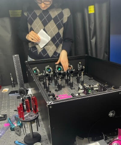 Anna rebuilding a TIRF microscope 2026
